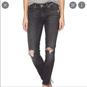 Levi’s 711 skinny jeans distressed and ripped in black